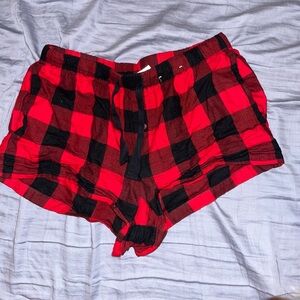 stars above red and black checkered pajama shorts size small